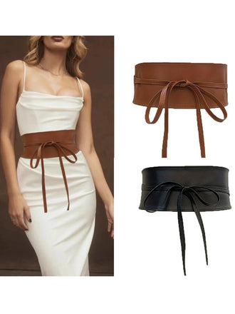 Brown and black Waistband with a model wearing a white dress.