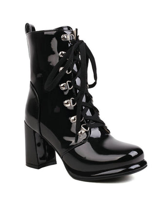 She finds her 1950s story in this Vintage Patent Leather Lace-Up High Heel Boots