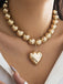 Vintage Heart Pendant Necklace — the 1950s finishing touch that makes her outfit sing