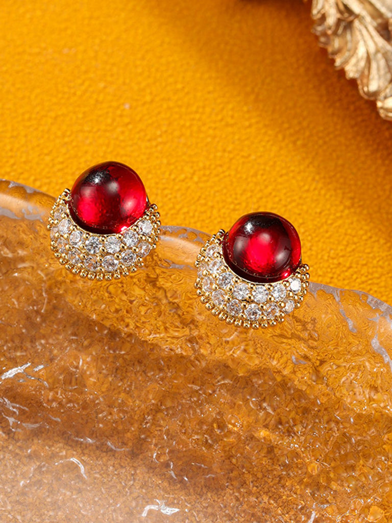 This Vintage Rhinestone Ruby Alloy Stud Earrings carries 1950s stories waiting to be told