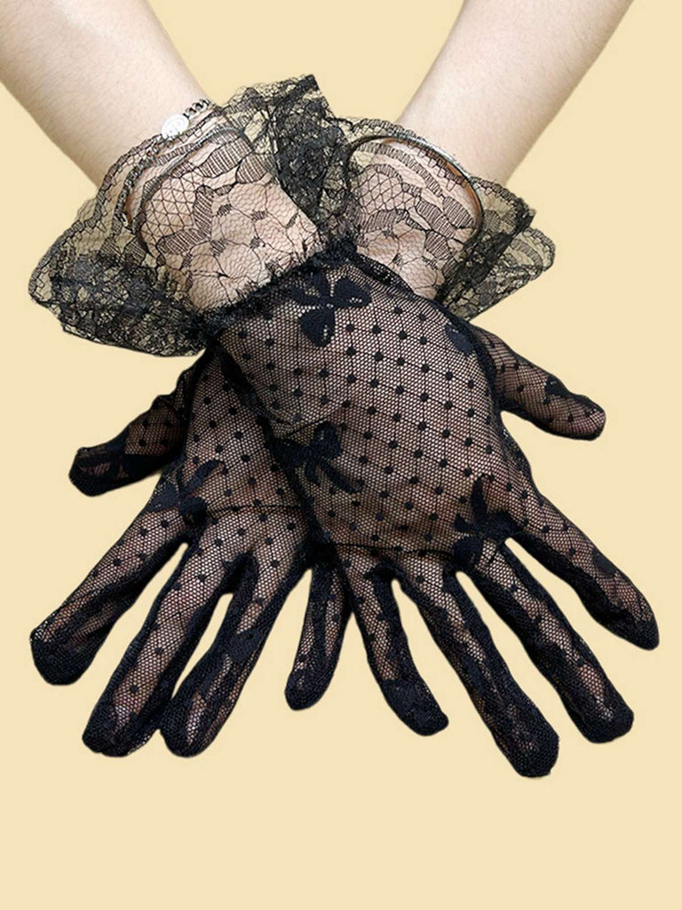 She adds this Vintage Solid Bow Lace Gloves and suddenly it's 1950s perfection