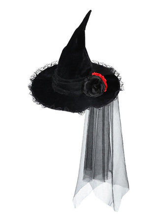 She adds this Vintage Wizard Witch Pointed Halloween Hat and suddenly it's 1950s perfection