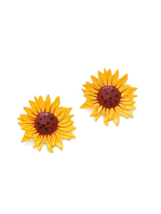 She adds this Vintage Yellow Sunflower Earrings and suddenly it's 1950s perfection