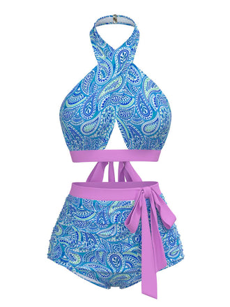 She's wearing Violet 1970s Paisley Print Cross-Halter Swimsuit and the whole beach remembers the 1970s