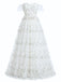 White dress with floral embroidery on a white background