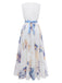Floral dress with a white top and blue floral skirt on a white background