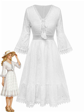 White lace dress with long sleeves on a white background