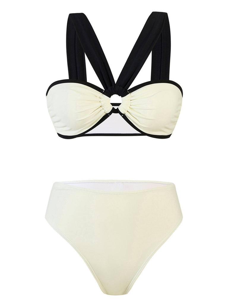 She's wearing White 1950s Colorblock Wide-Straps Swimsuit and the whole beach remembers the 1950s