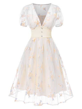 She slips into this White 1950s Deep V-Neck Embroidered Floral Dress and suddenly it's a 1950s daydream