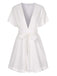 She adds this White 1950s Deep V-Neck Textured Belted Romper and suddenly it's 1950s perfection