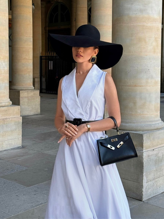 She slips into this White 1950s Halter Belted Swing Dress and suddenly it's a 1950s daydream
