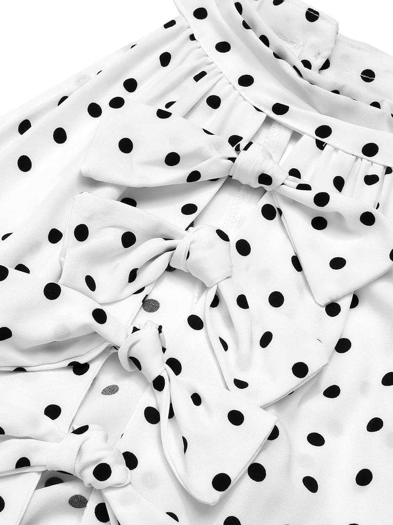 This White 1950s Halter Polka Dots Bow Dress wraps her in 1950s elegance, one twirl at a time
