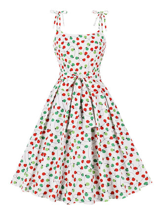 She slips into this White 1950s Light String Shoulder Tie Dress and suddenly it's a 1950s daydream