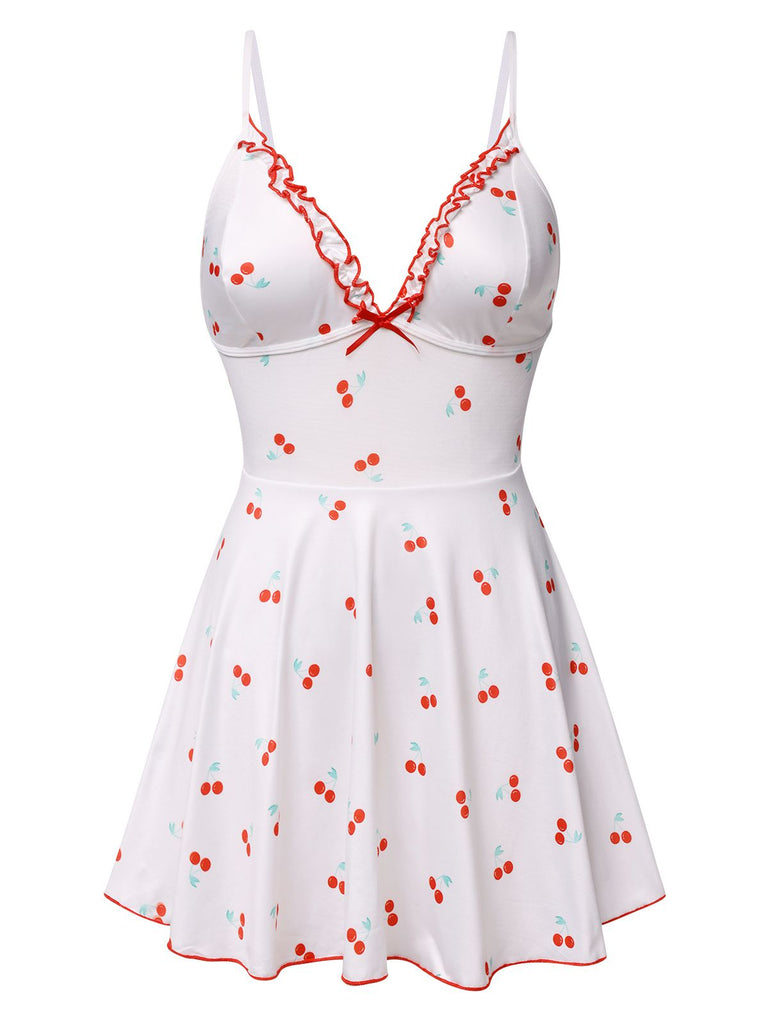 She slips into White 1950s Spaghetti Strap Cherry Bow Sleepwear and channels 1950s screen sirens