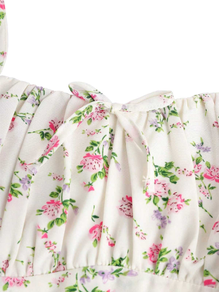 This White 1950s Spaghetti Strap Floral A-Line Dress wraps her in 1950s elegance, one twirl at a time