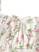 This White 1950s Spaghetti Strap Floral A-Line Dress wraps her in 1950s elegance, one twirl at a time