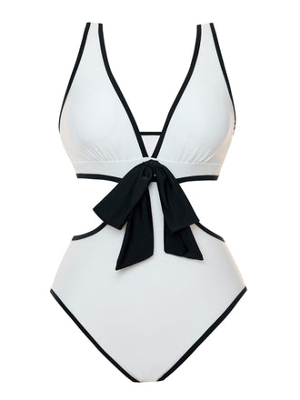 She's wearing White 1950s Waist Hollow Binding Bow Swimsuit and the whole beach remembers the 1950s