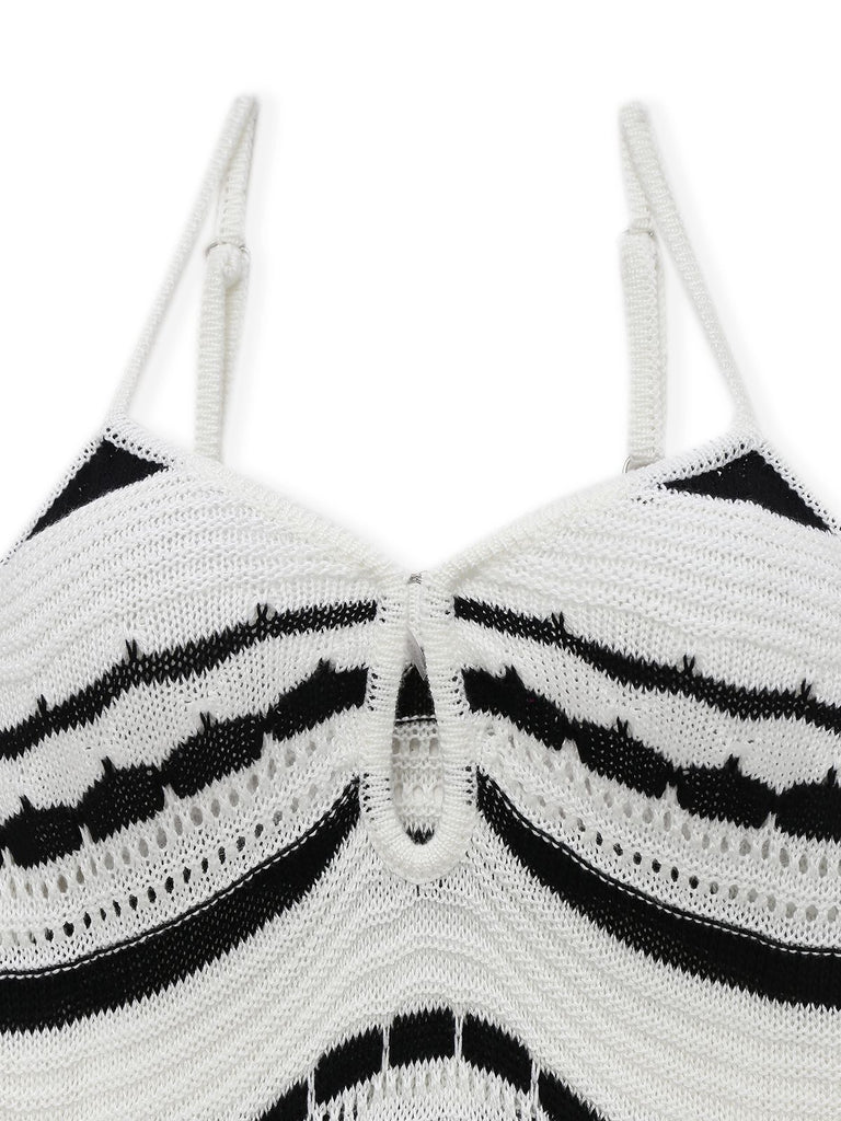 This White 1970s Striped Knit Bodycon Dress wraps her in 1970s elegance, one twirl at a time