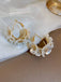 This White 3D-Flower Pearl Earrings carries vintage stories waiting to be told