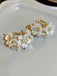 White 3D-Flower Pearl Earrings — vintage elegance in the palm of her hand