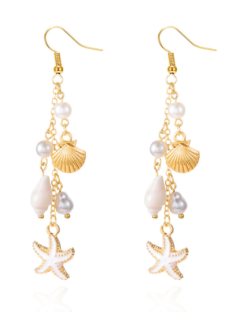 Gold and pearl earrings with starfish and shell designs on a white background