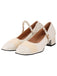 She finds her vintage story in this White Pearl Strap Chunky Heel Shoes