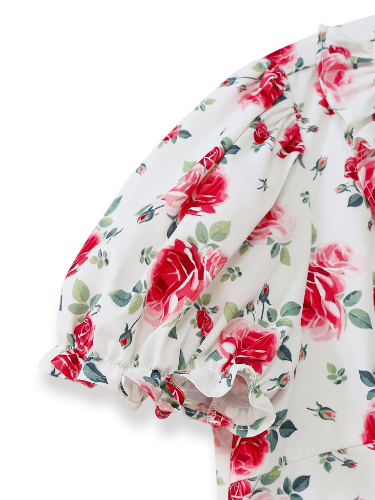 Floral dress with red roses on a white background