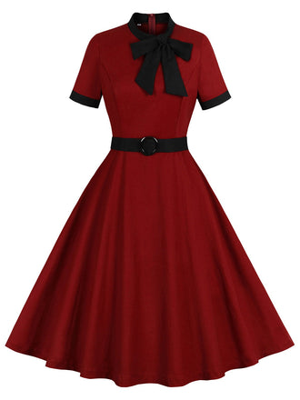 She slips into this Wine Red 1950s Tie Neck Contrast Patchwork Dress and suddenly it's a 1950s daydream