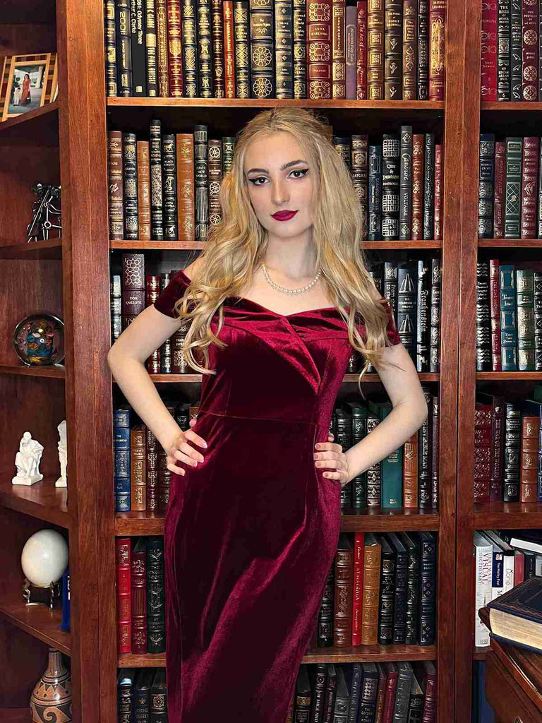 She slips into this Wine Red 1960s Velvet Bodycon Dress and suddenly it's a 1960s daydream