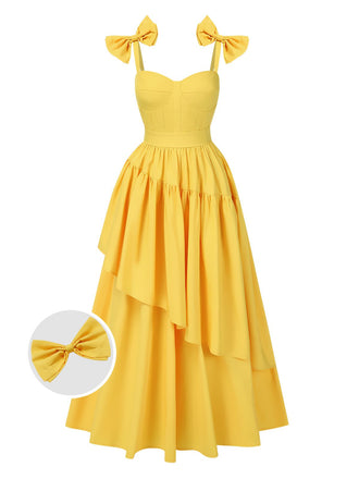 She slips into this Yellow 1950s Heart Neck Bow-Strap Tiered Dress and suddenly it's a 1950s daydream