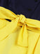 This Yellow 1950s Patchwork Shirt Collar Swing Dress wraps her in 1950s elegance, one twirl at a time