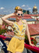 Yellow 1950s Sunflower Halter Romper: timeless style reimagined
