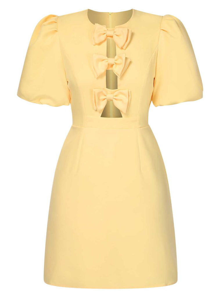 Yellow 1960s Bow Puff Sleeve Solid Dress: where 1960s romance meets her modern spirit