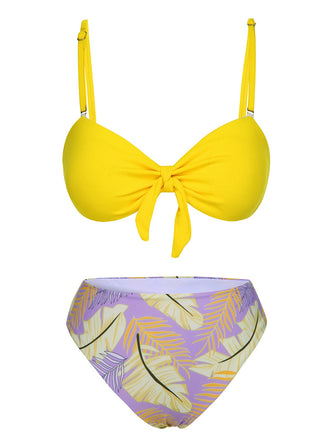 She's wearing Yellow 1960s Plant Prints Halter Bow Swimsuit and the whole beach remembers the 1960s