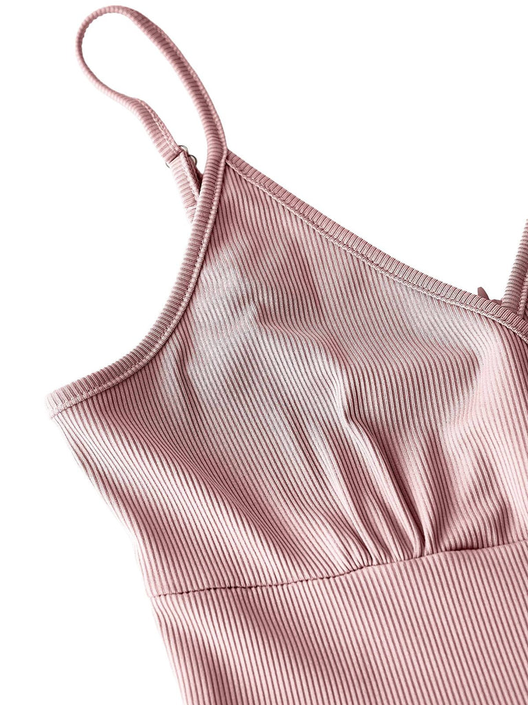 Detailed shot of the adjustable spaghetti straps and gathered neckline on the cami jumpsuit.