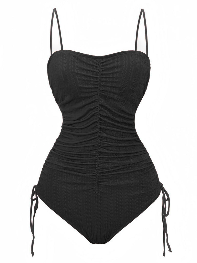 Black ruched swimsuit with thin straps on a white background
