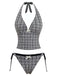 Retro black plaid halter tankini set featuring deep V-neck styling and classic 1960s charm, ideal for summer swimming and beachside activities