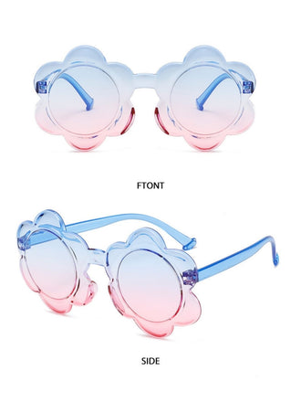 Flower-shaped sunglasses with blue-to-pink gradient lenses and transparent blue frames, perfect for a vibrant summer look.