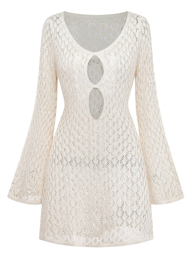 Front view of a cream crochet beach cover-up featuring bell sleeves and a deep V-neck with oval cut-outs.