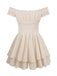 Back view of the cream smocked mini dress highlighting the tiered ruffle skirt and stretchy fit.