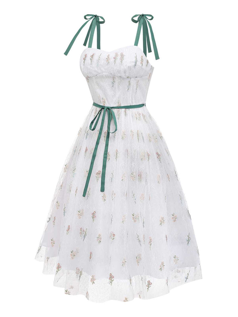 Side perspective of the dress showcasing the lightweight, airy layers of the tulle skirt.