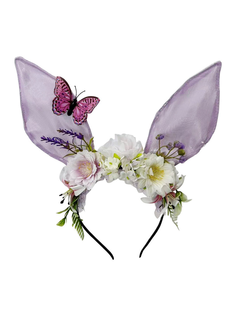 Whimsical pink fairycore headband with sheer bunny ears, silk flowers, and a purple butterfly accent.