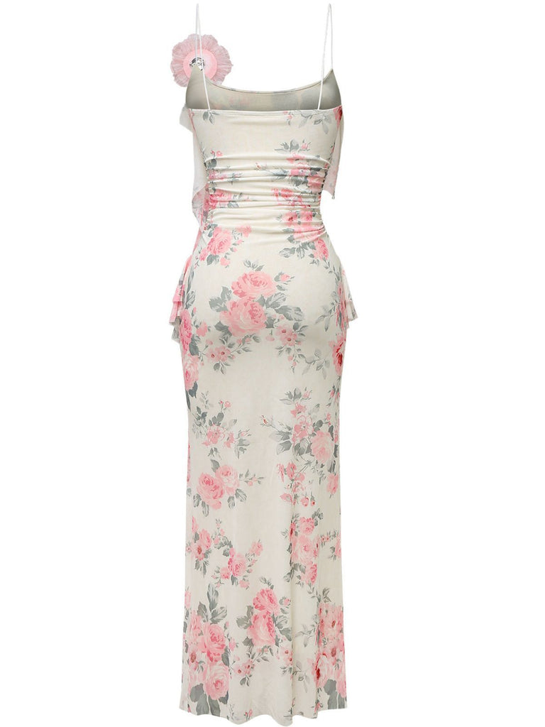Rear view of the pink floral maxi dress showcasing the low-back design and floor-length hemline.