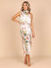 A model wearing the white floral sleeveless midi dress against a neutral studio background.