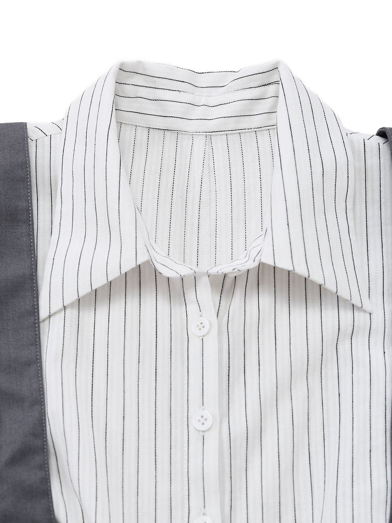 Close-up of a white shirt with black stripes on a white background