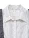 Close-up of a white shirt with black stripes on a white background