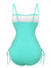 Turquoise swimsuit with white top on a white background