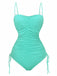 Mint green swimsuit with ruched design on a white background