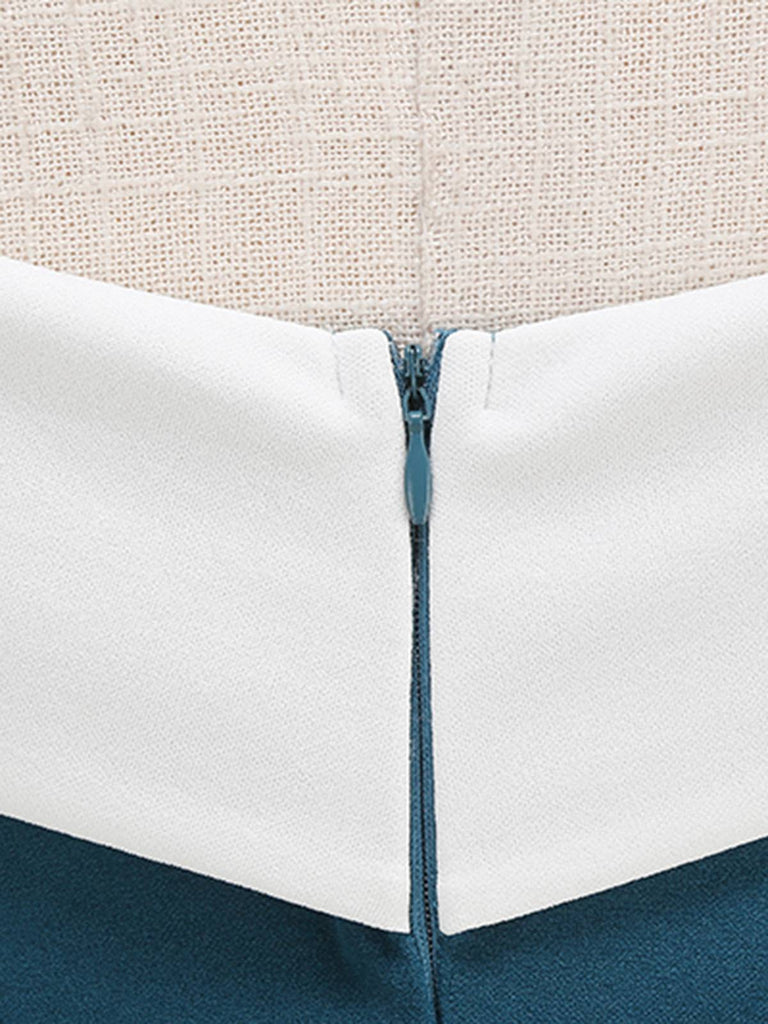 Close-up of a white and blue fabric edge with a beige background