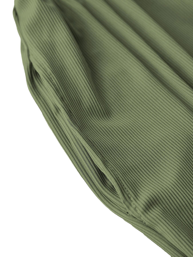Close-up of green fabric with a textured pattern